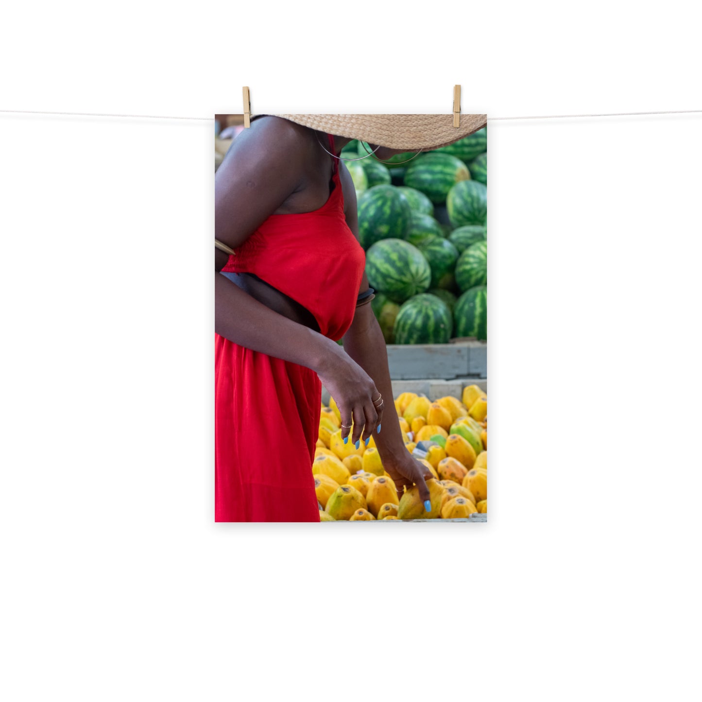 A vibrant photo of a woman shopping for tropical fruits at Coronation Market, Kingston, Jamaica.