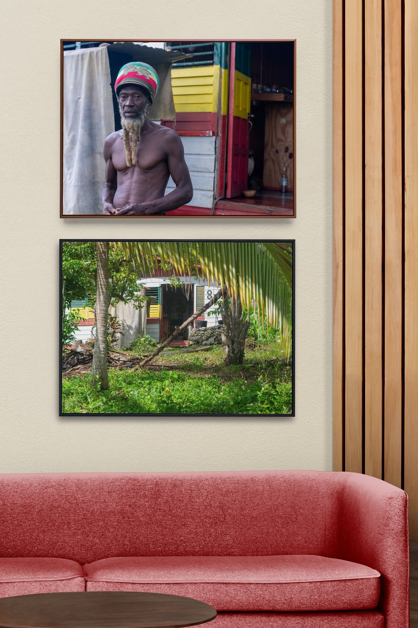 A vibrant photo of a Rastaman handing before his house in the hills of Hanover, Jamaica in a living room gallery wall.