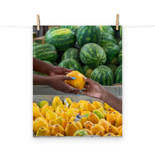 A vibrant photo of two friends shopping for tropical fruits at Coronation Market, Kingston, Jamaica.