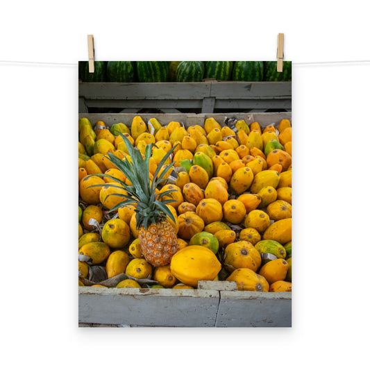 A vibrant photo of pineapple and papaya at Coronation Market, Kingston, Jamaica.