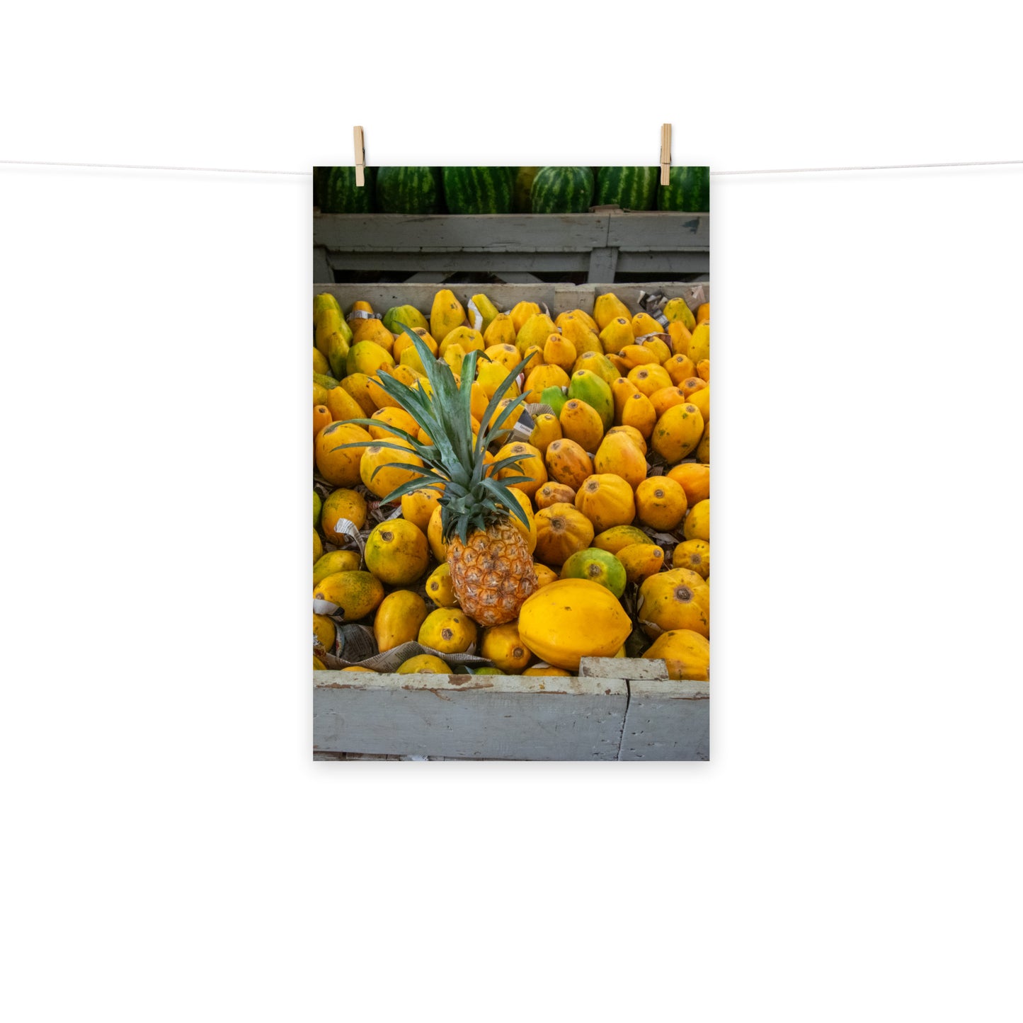 A vibrant photo of pineapple and papaya at Coronation Market, Kingston, Jamaica.