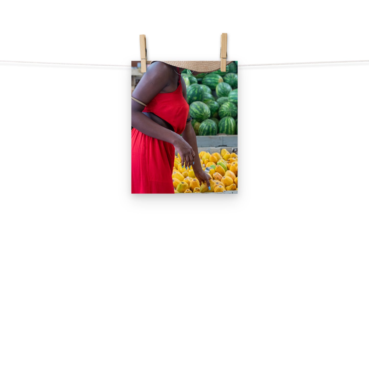 A vibrant photo of a woman shopping for tropical fruits at Coronation Market, Kingston, Jamaica.